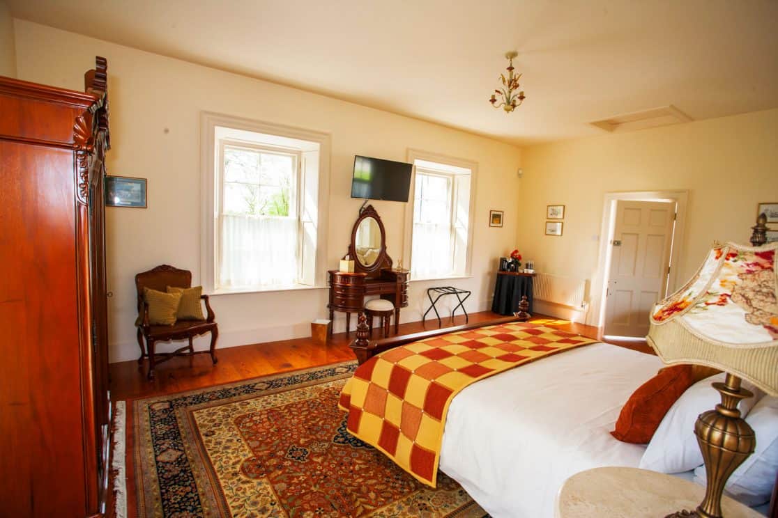 Chambord Suite bathroom at Clonganny House Wexford — double-width shower with mosaic tiles and luxury fittings