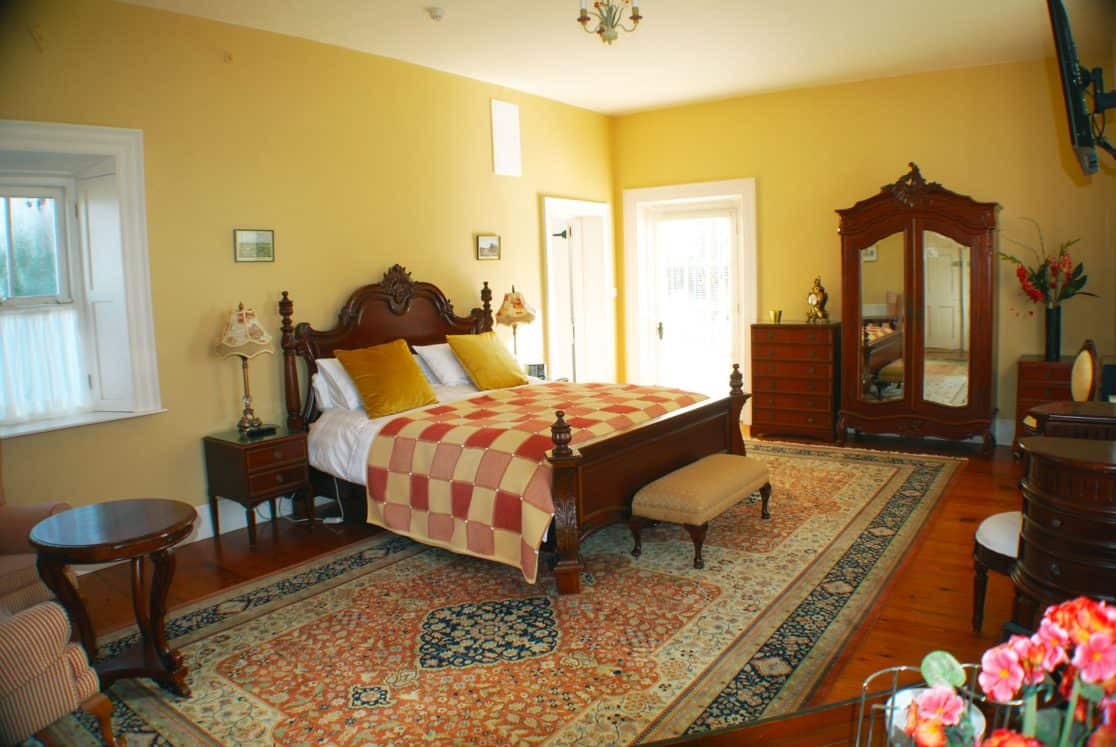 Chambord Suite at Clonganny House Wexford — quilted bed, walnut furniture, patio doors and flat screen smart TV