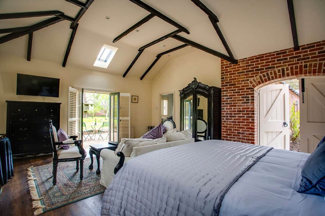 Cheverney Suite at Clonganny House Wexford — super king bed, sofa and French doors to private walled garden patio