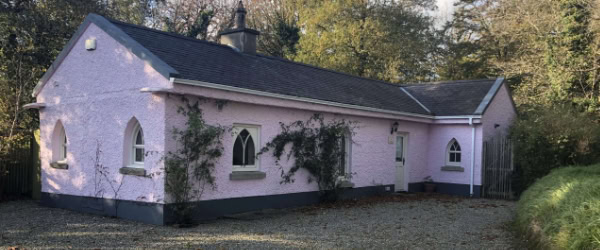The Gate Lodge exterior at Clonganny House — charming pink self-catering cottage, Ballygarrett, Co. Wexford